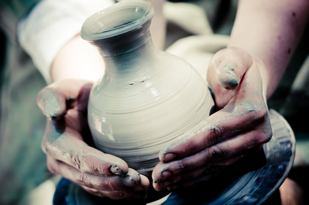 A piece of pottery being turned at Love Clay