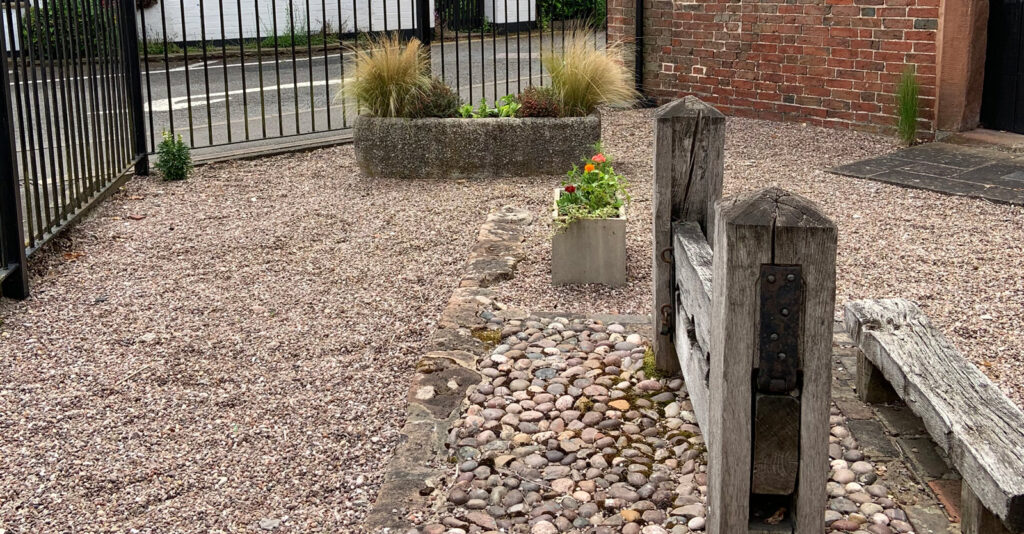 An image of the old stocks at Penkridge Old Gaol.