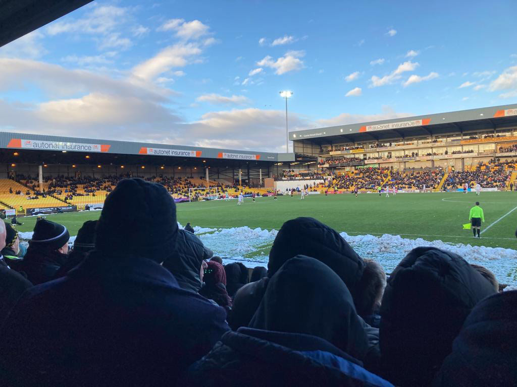 Supporters look out over the field at Port Vale Football Club