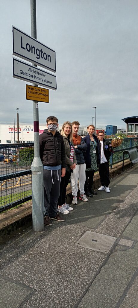 Picture showing a group of people waiting at Longton train station.