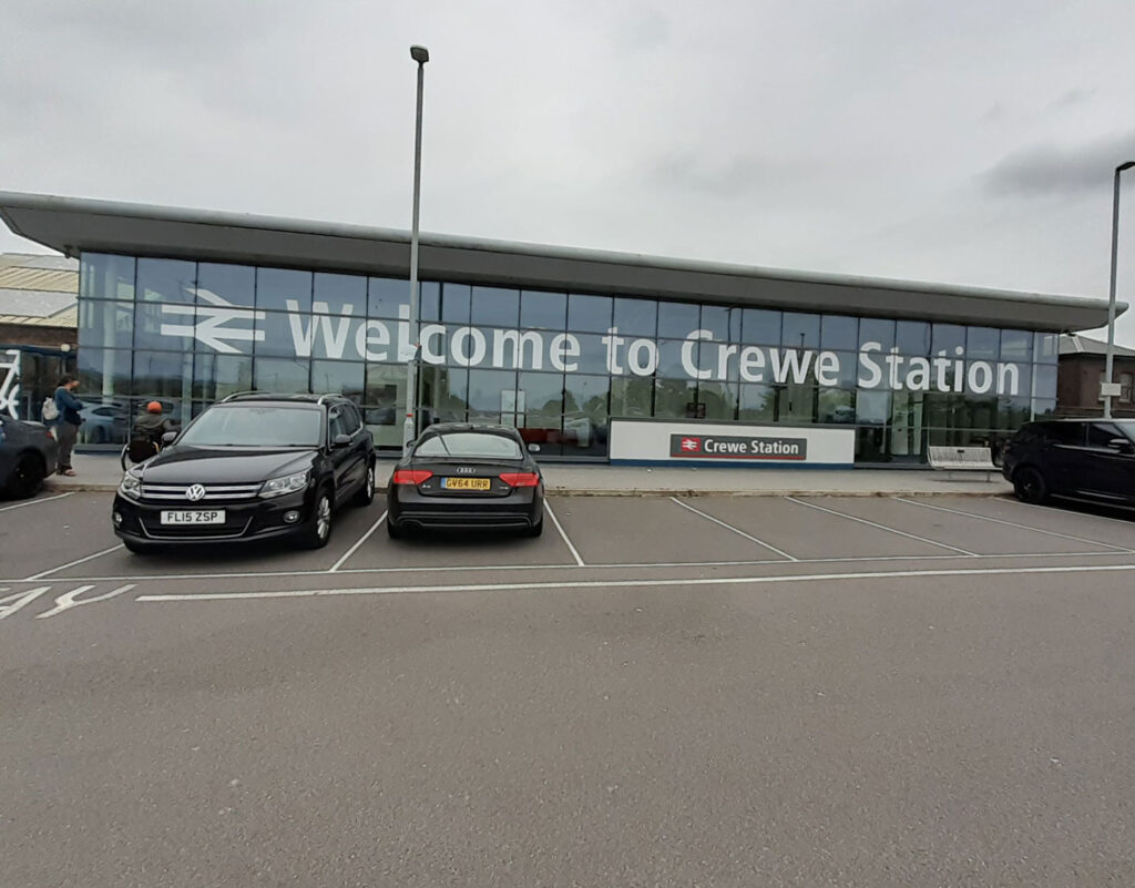 Image showing the main entrance and sign of Crewe Station