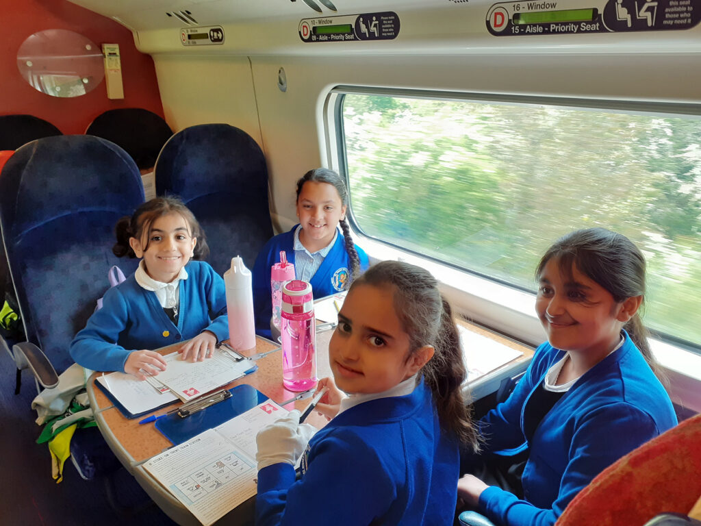 A group of children from St Mark's primary school enjoying a train ride