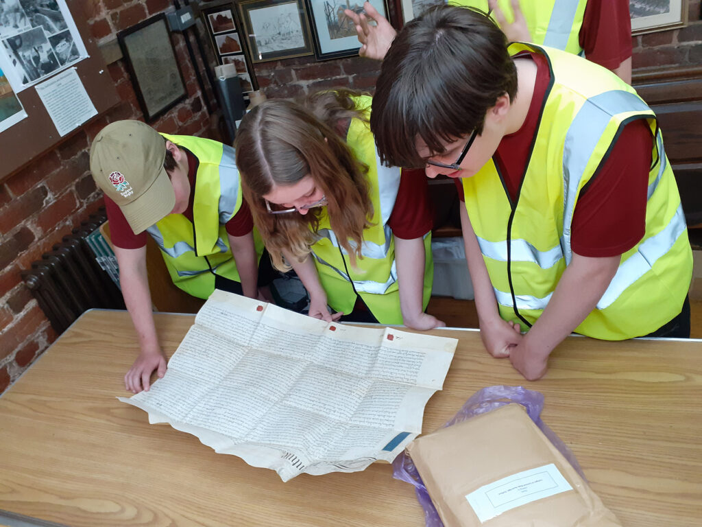 A group of students studying the history of Penkridge