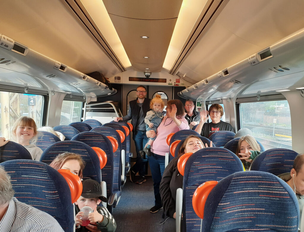 A group of people enjoying a train ride